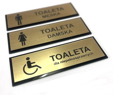 Tabliczka na drzwi TOALETA – męska, damska, dla niepełnosprawnych – złoto szczotkowane + czarne plexi – 21 × 7 cm